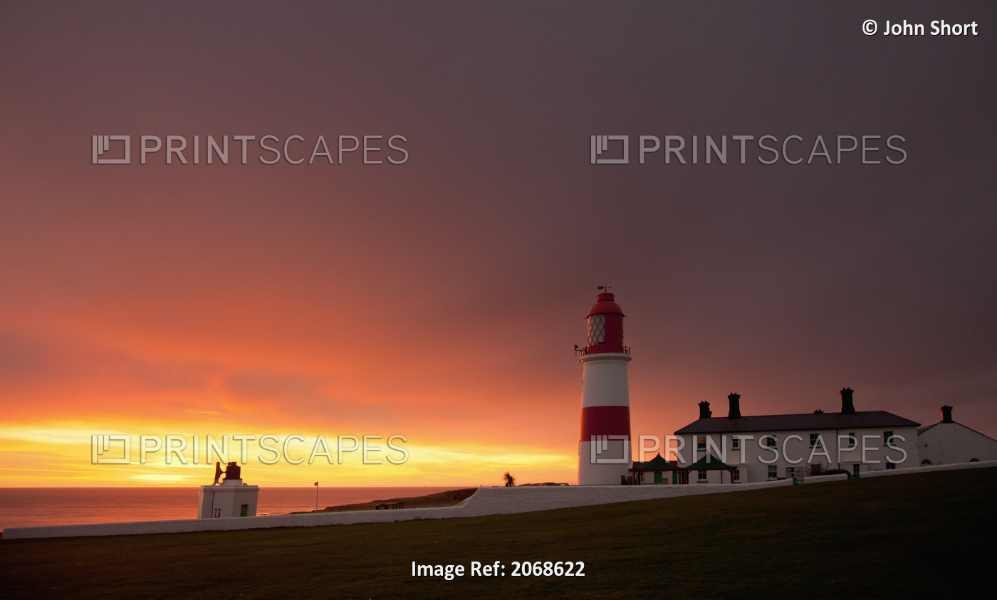A Lighthouse On The Coast At Sunset; Whitburn, Tyne And Wear, England
